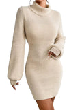 Beige knitted dress worn by a person against a white background