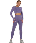 Person wearing a purple athletic outfit on a white background