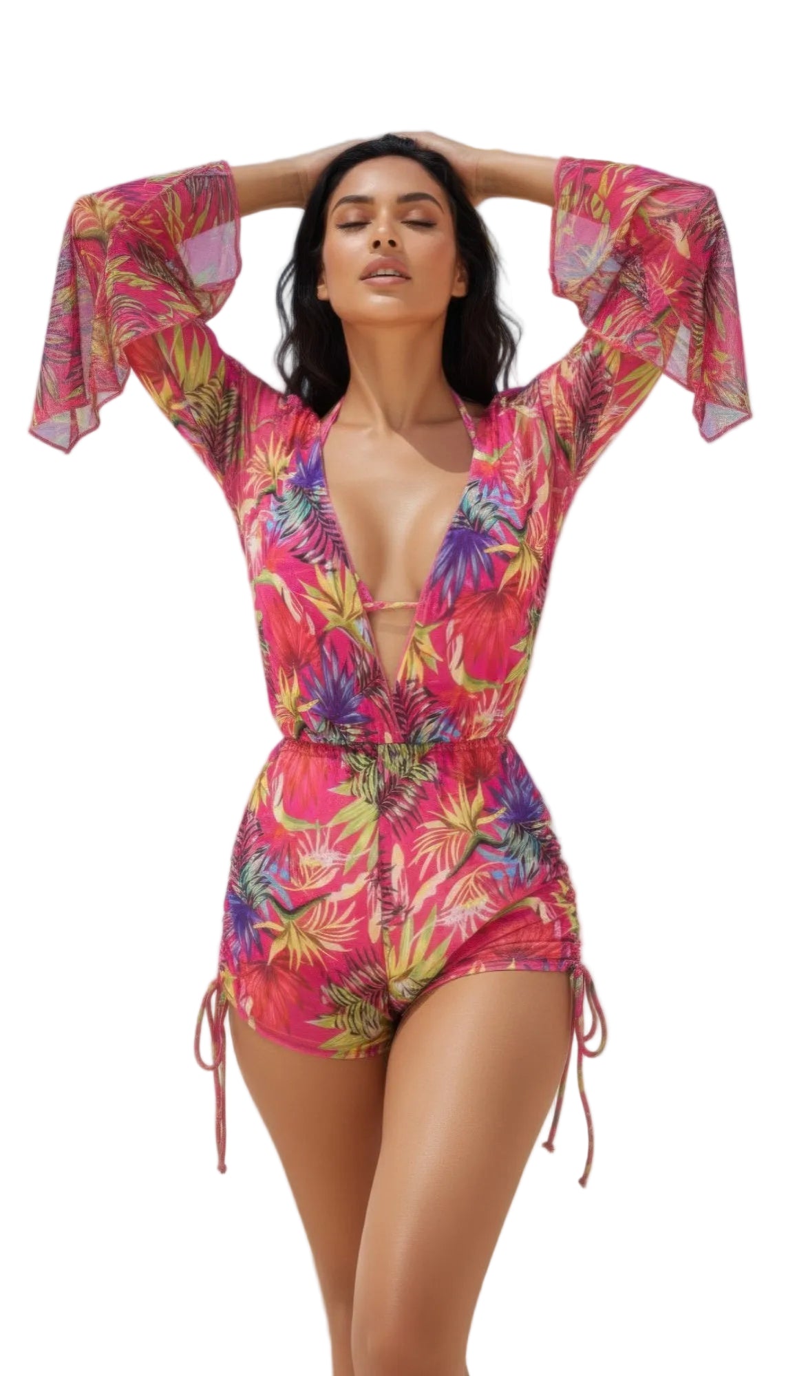 Woman in a colorful floral swimsuit on a beach