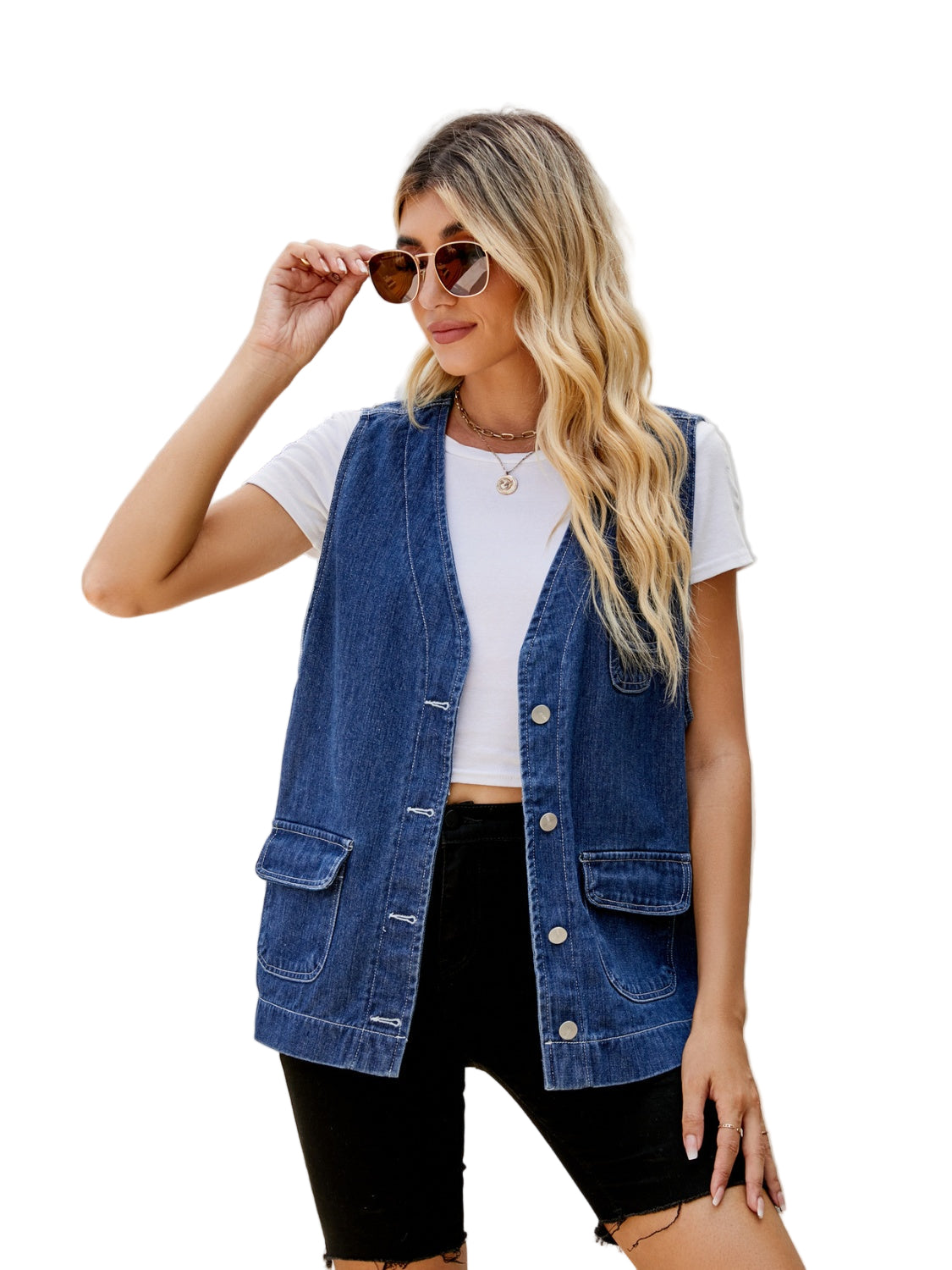 Women wearing denim vest with a white background.