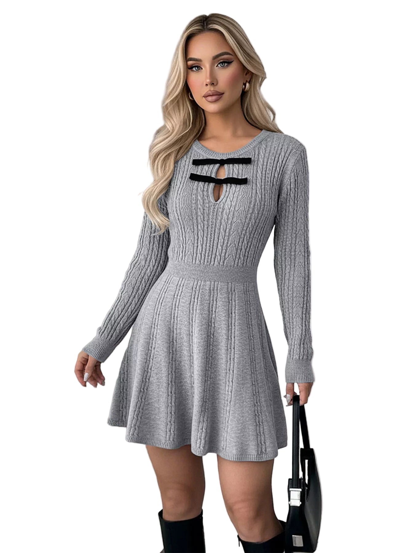 Woman wearing a gray ribbed dress with black accents in an urban setting.