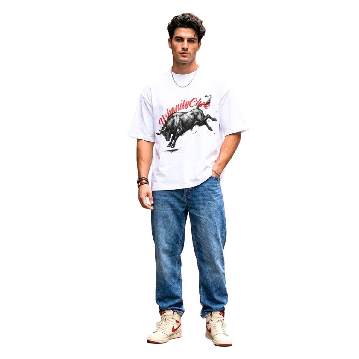 Man wearing a white t-shirt with a graphic design and blue jeans on a white background