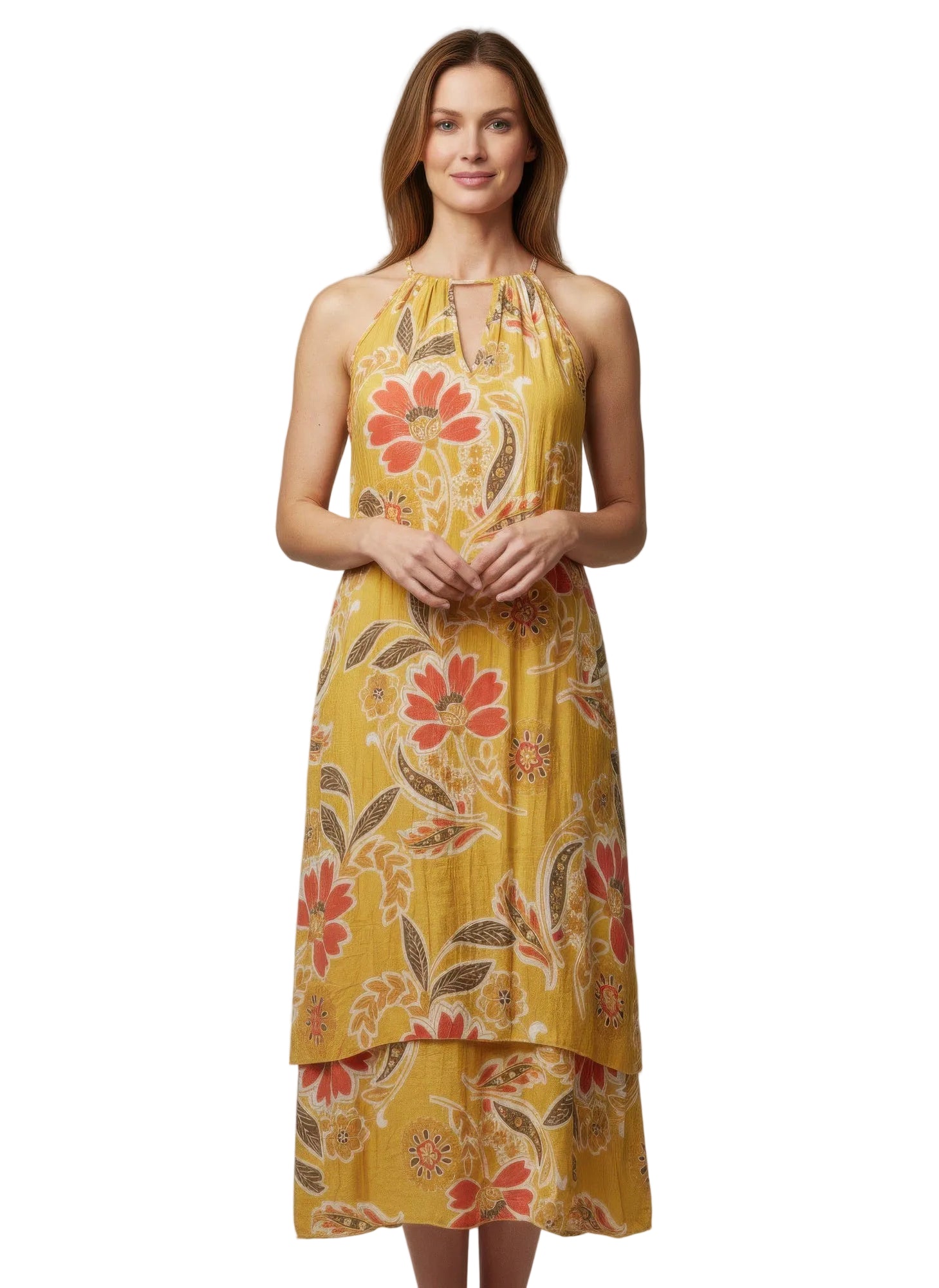 Woman wearing a yellow floral dress against a gray background