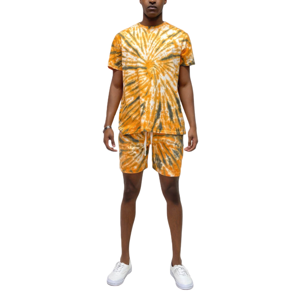 Person wearing a tie-dye outfit with a white background