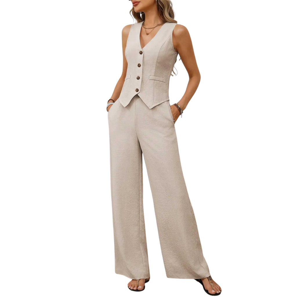 Woman wearing a beige vest and wide-leg pants on a white background
