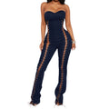 Navy blue strapless jumpsuit with lace-up details on a white background