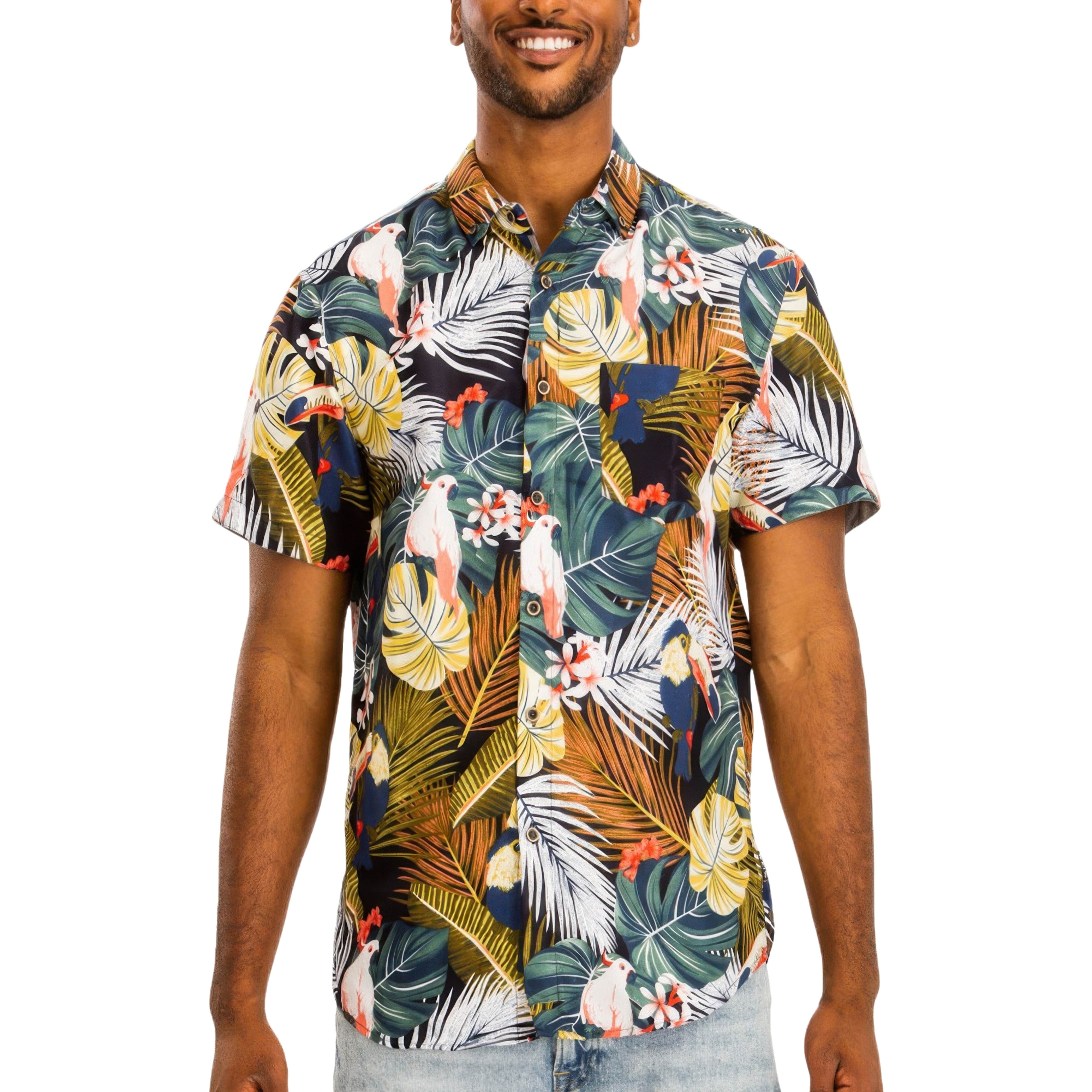 Man wearing a colorful tropical patterned shirt on a white background
