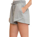 A pair of gray women's sweatshorts with a drawstring waist and pockets.