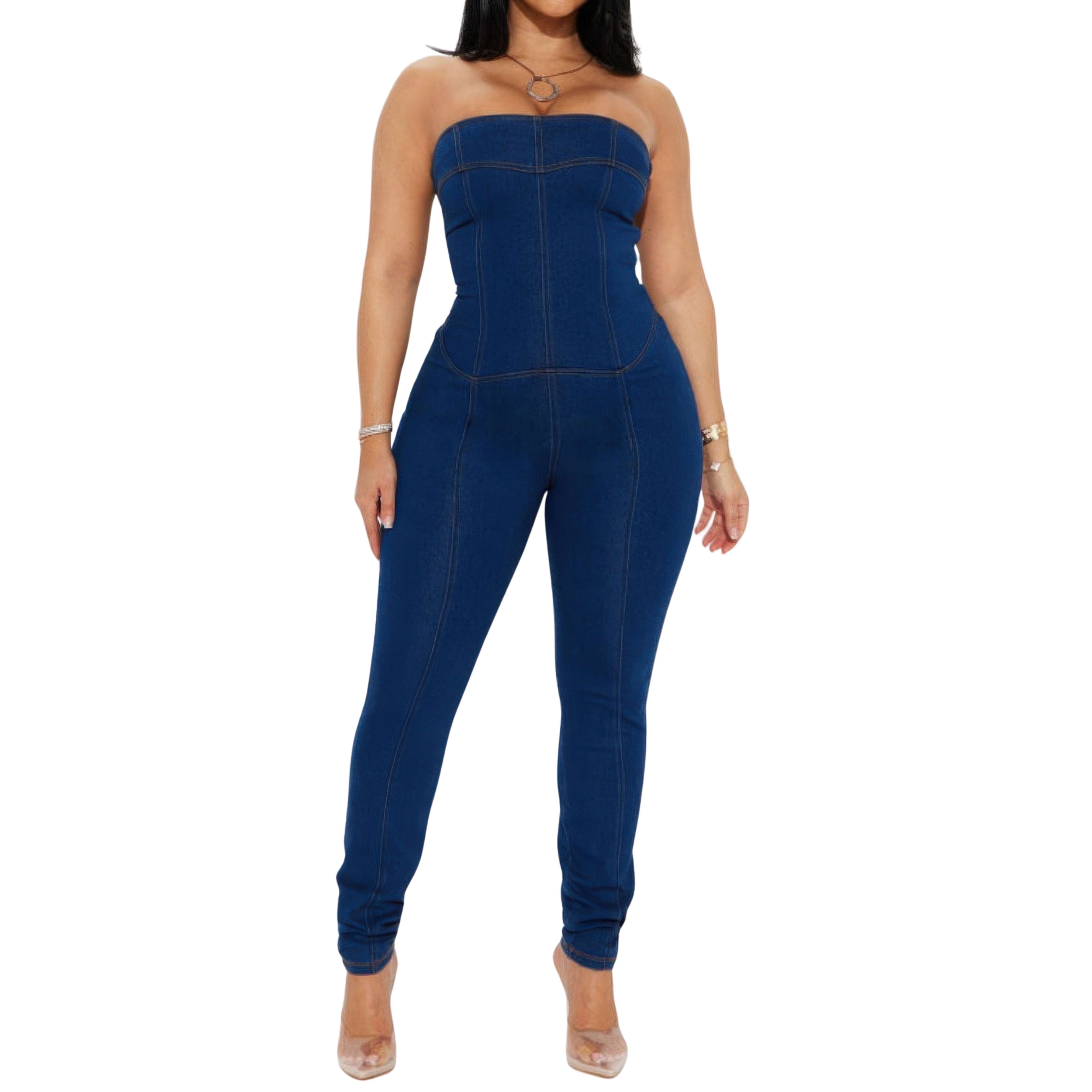 Woman wearing a blue strapless jumpsuit on a white background