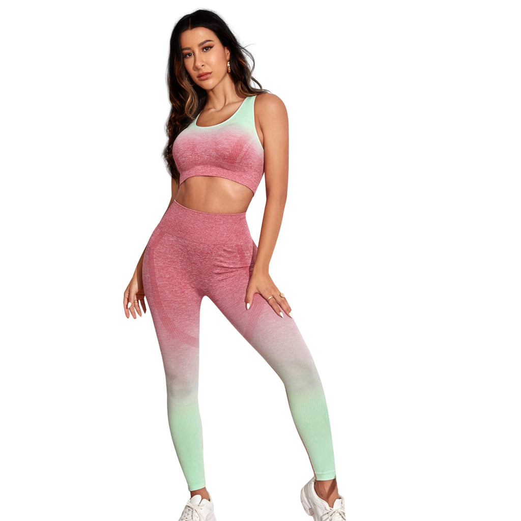 Woman wearing a gradient sports bra and leggings set on a white background