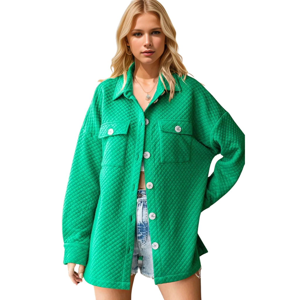 Woman wearing a green quilted jacket on a white background