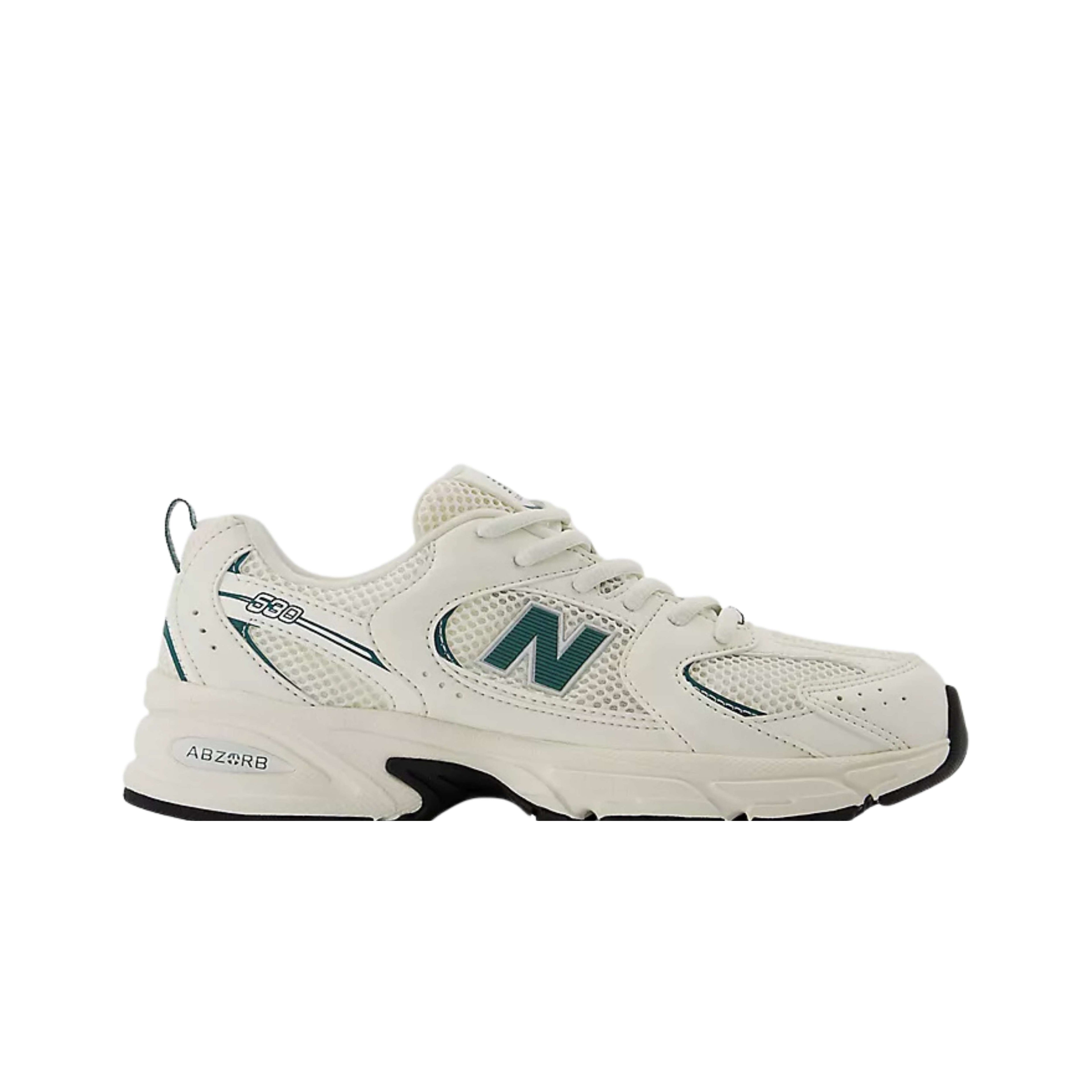 White sneaker with green accents on a white background