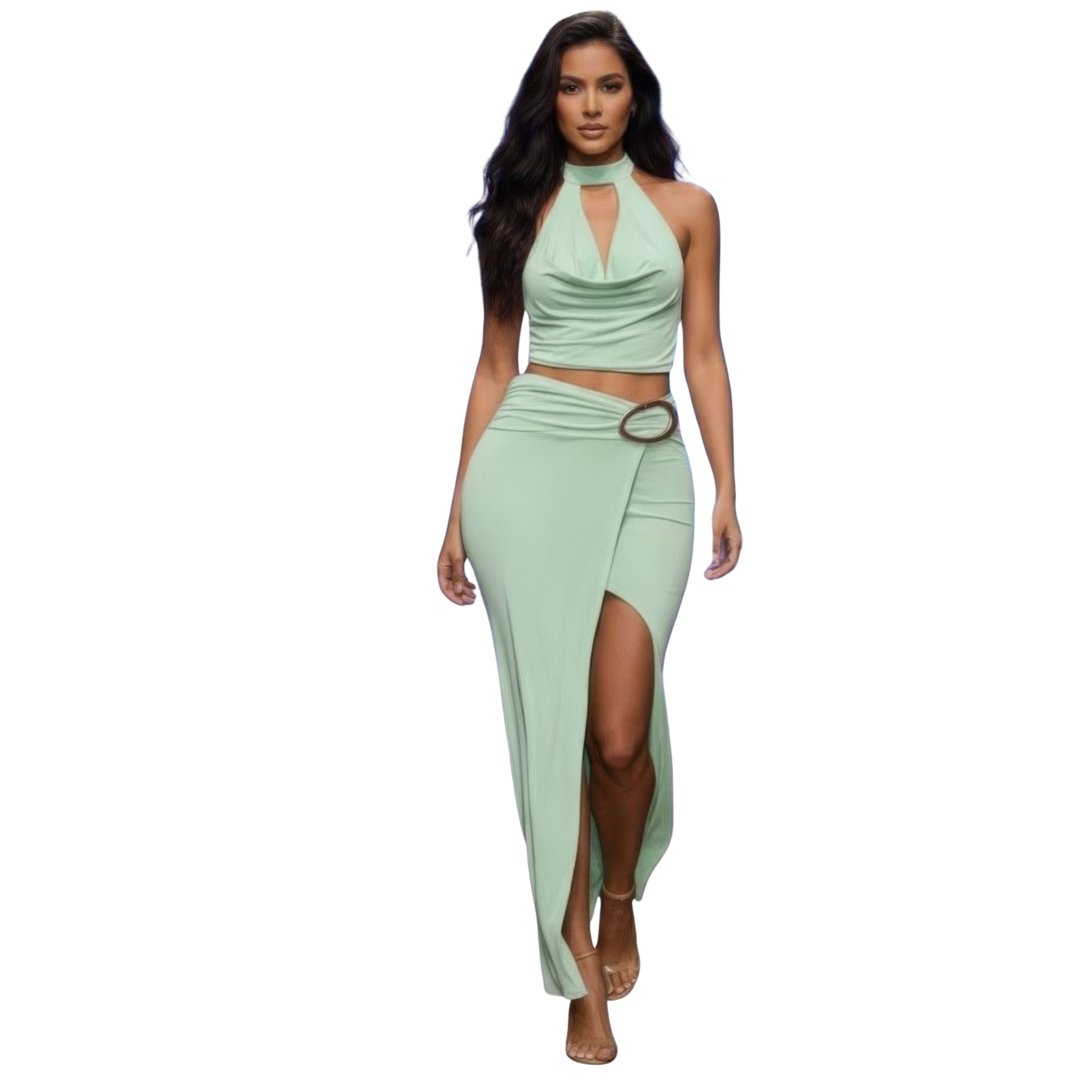 Woman wearing a light green two-piece outfit with a cut-out top and high-slit skirt on a white background.