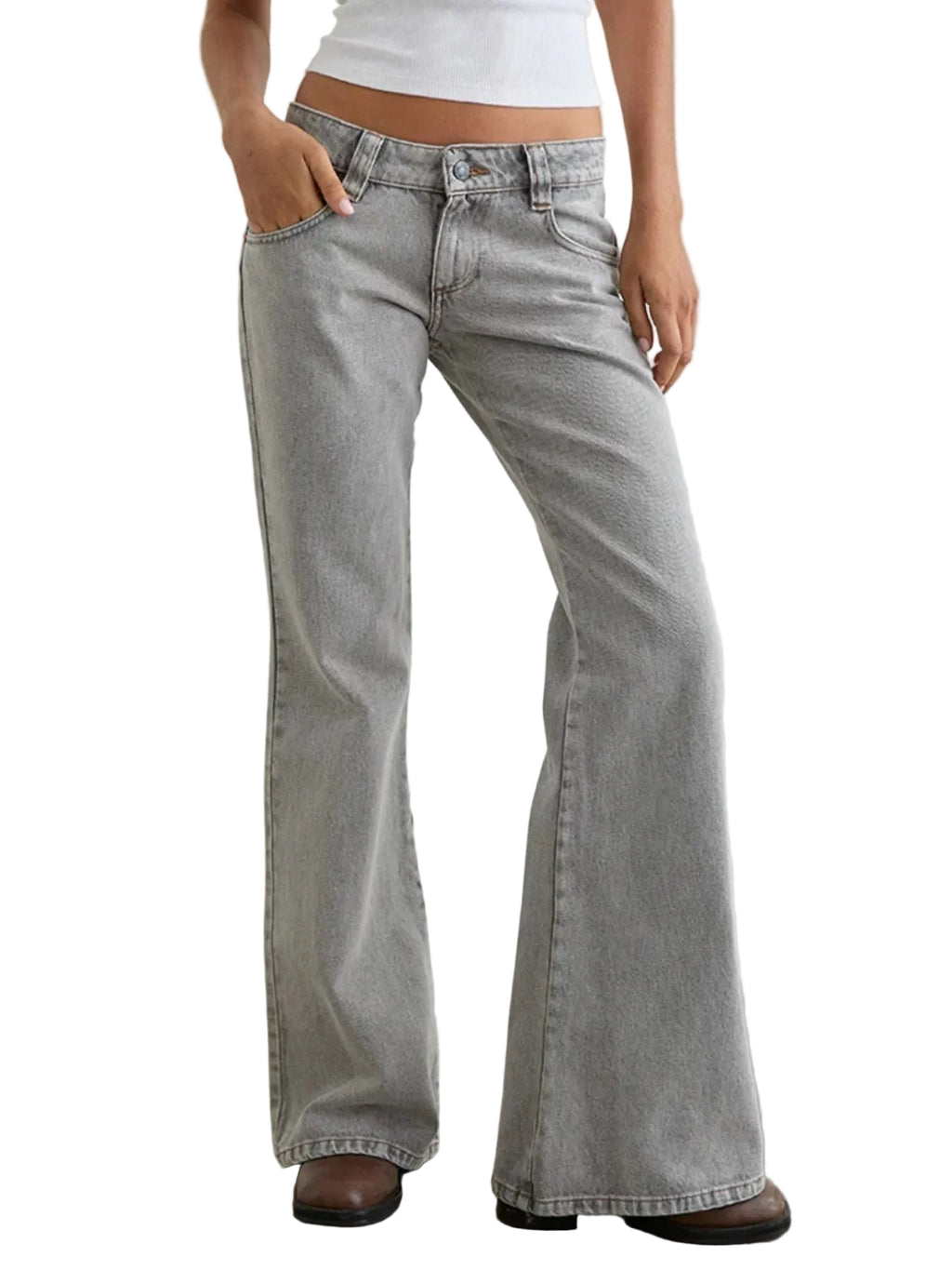 Person wearing light gray flared jeans on a plain background