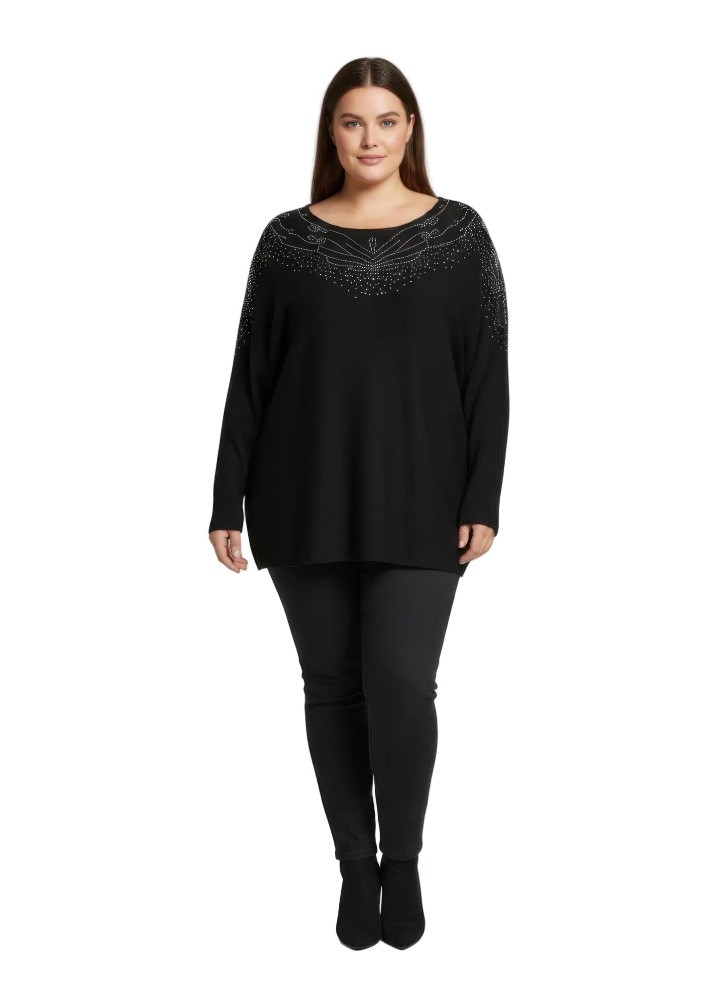 Woman wearing a black Plus Top with intricate detailing on a gray background