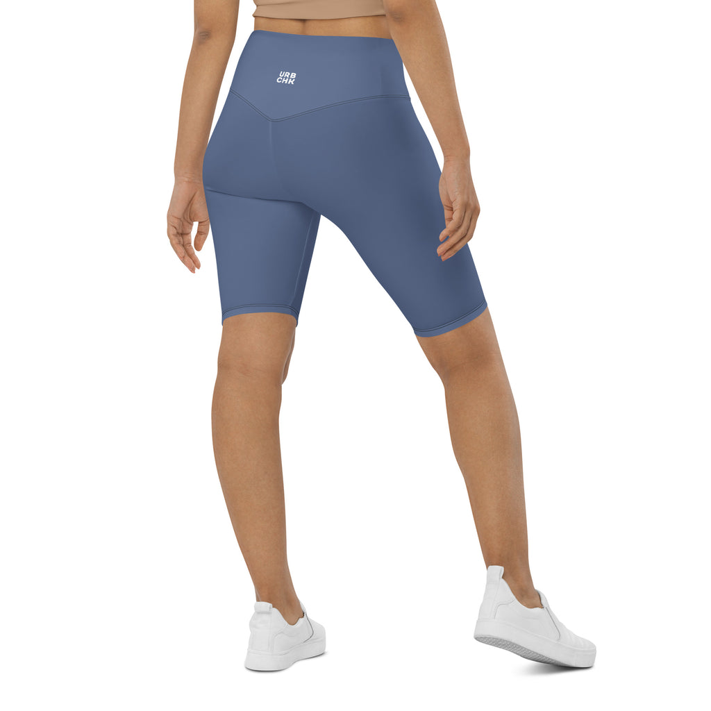 A pair of high-waisted blue biker shorts with a double-layered waistband and a pocket in the back. The shorts are designed for comfort and style, suitable for various activities.