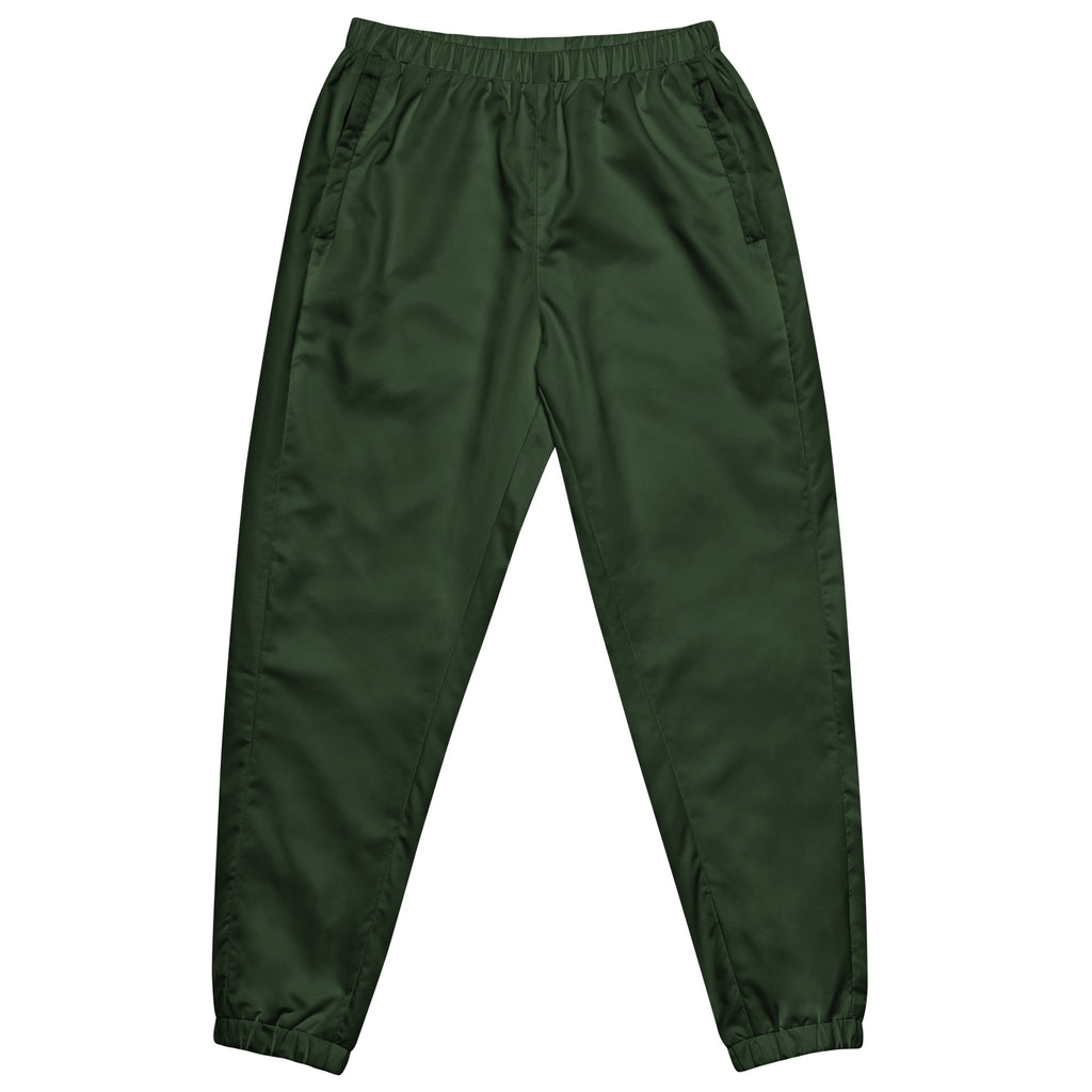 A pair of green women's track pants with elastic waistband and ankle cuffs, featuring drawcord and zip pockets.