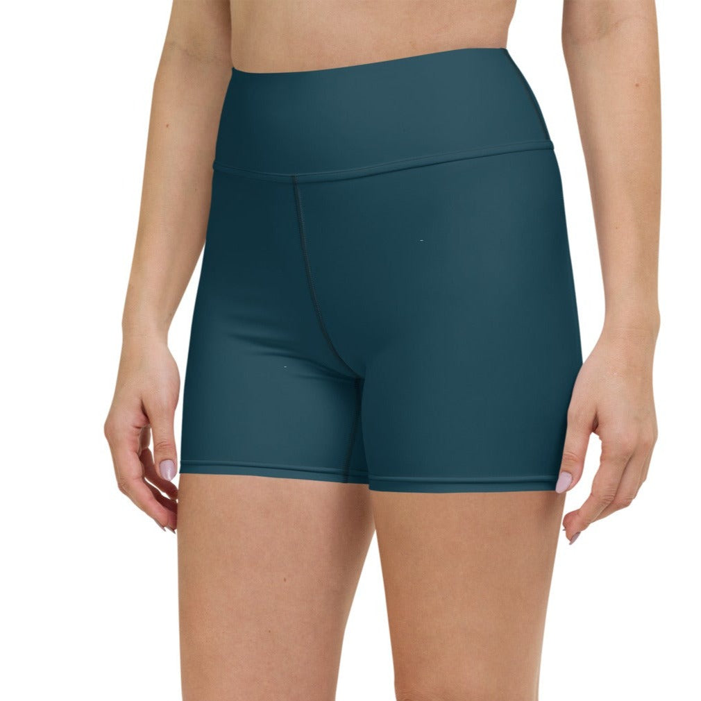 A pair of navy blue premium women's active shorts with a high waistband, designed for workout and activewear.