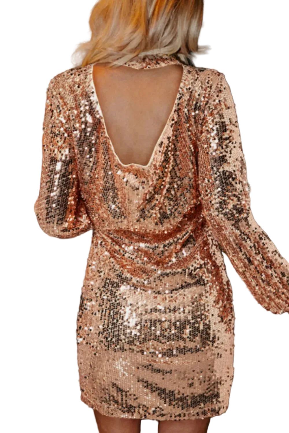Rose gold sequin dress with a backless design, worn by a person, with a blurred festive background.