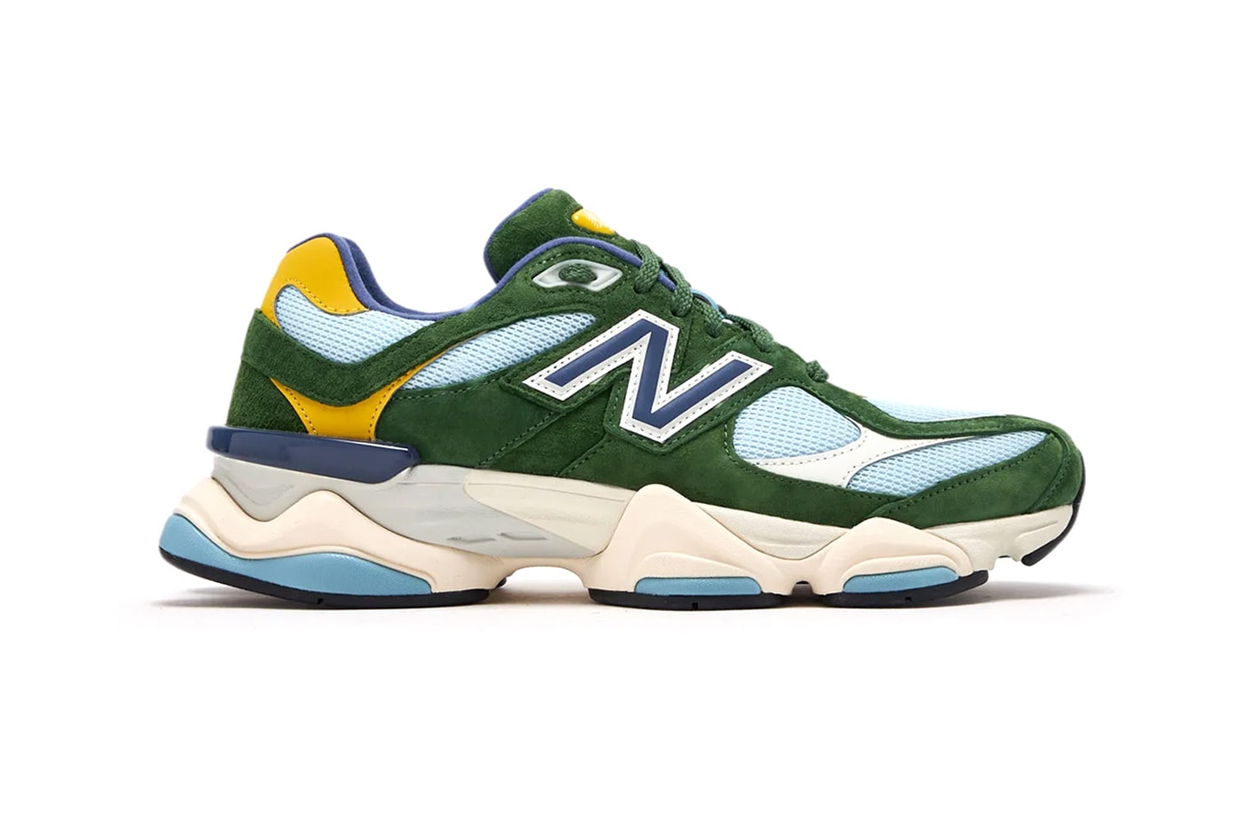New Balance Green sneaker with blue and yellow accents on a white background