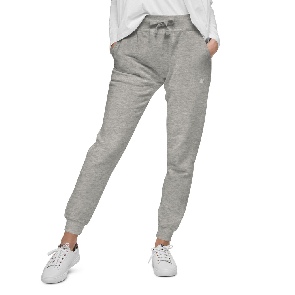 A pair of gray fleece sweatpants with an elastic waistband and drawstrings, featuring two pockets on the front.