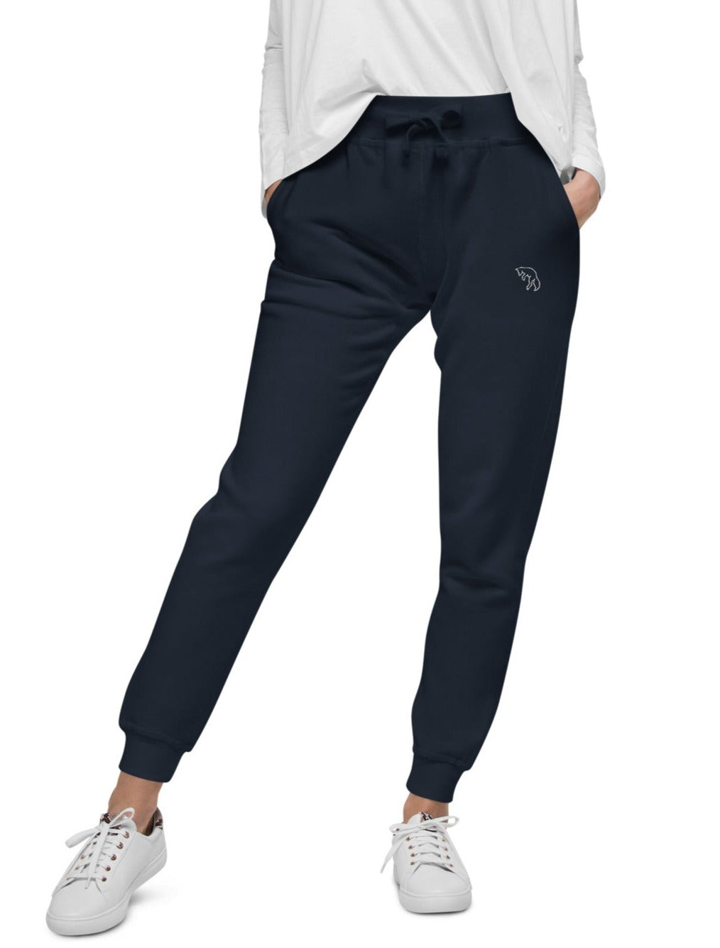 A pair of navy blue sweatpants for women, featuring a logo on the upper left thigh area, with an elastic waistband and drawstrings.